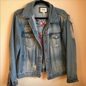 Distressed denim jacket